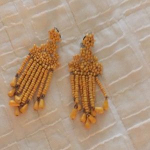 Noonday Duchess CLIP on earrings.